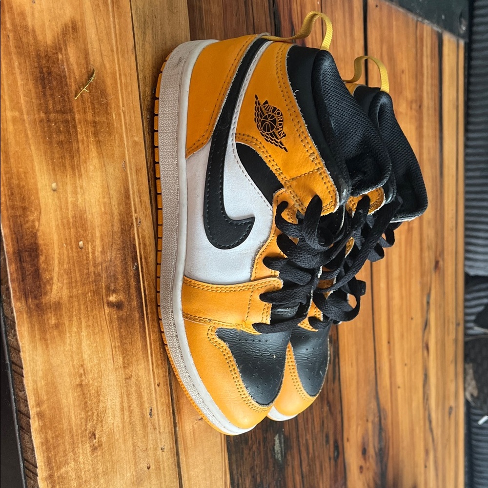 Nike Black, White, and Orange High-Tops